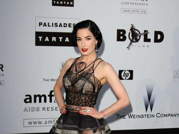 Dita Von Teese attended in 2009 while wearing a black dress with daring details.
