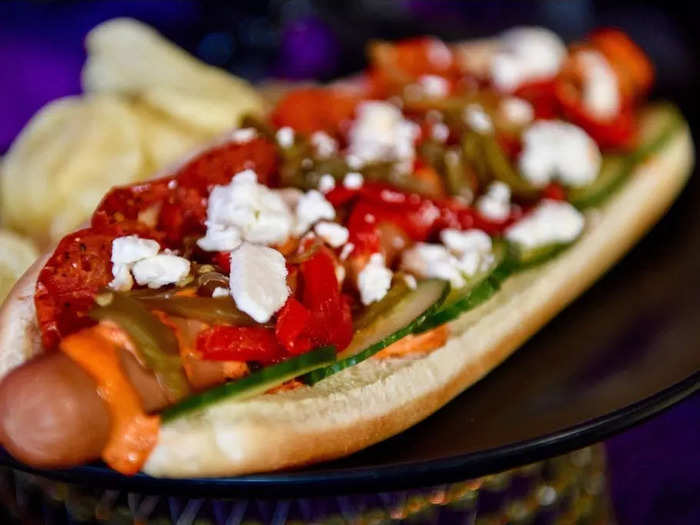 Greek food-inspired toppings put a Mediterranean twist on a traditional hot dog.