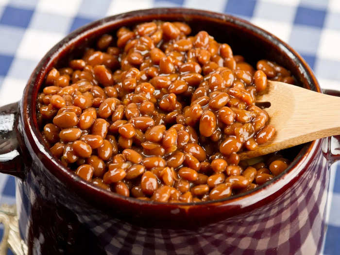 Adding some baked beans as a topping makes hot dogs a lot more flavorful.