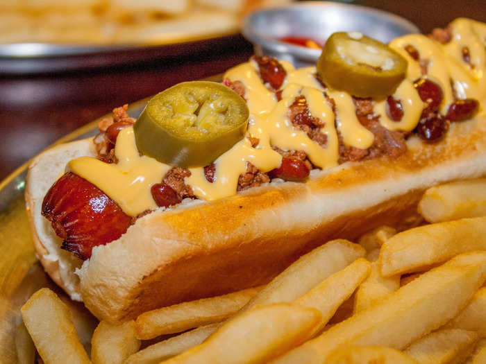 Sliced jalapeños turn up the heat on a classic hot dog.