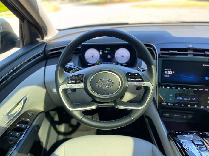 In front of the driver is a nicely molded, leather-wrapped steering wheel.