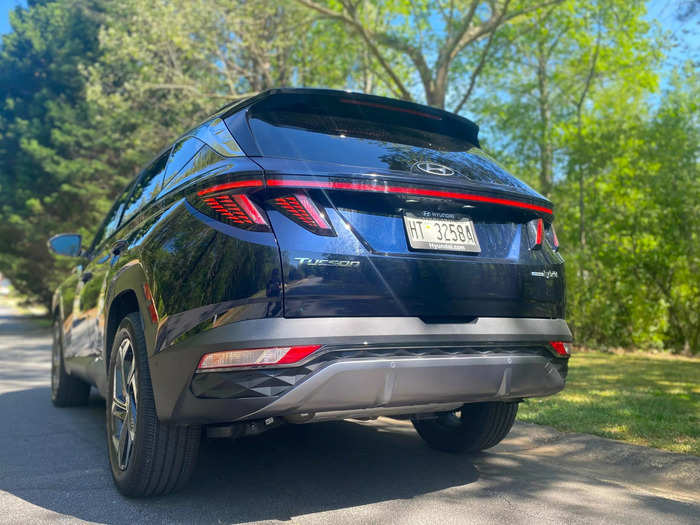 The rear of the Tucson features vertical LED taillights protruding from a light bar that runs across the tailgate. 