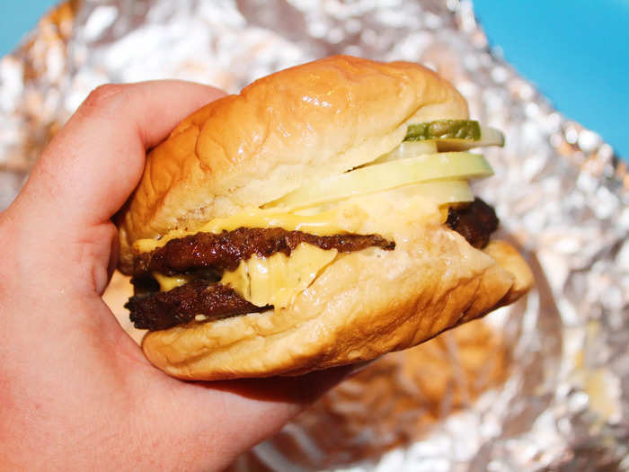 The burger came wrapped in foil and featured two juicy patties.