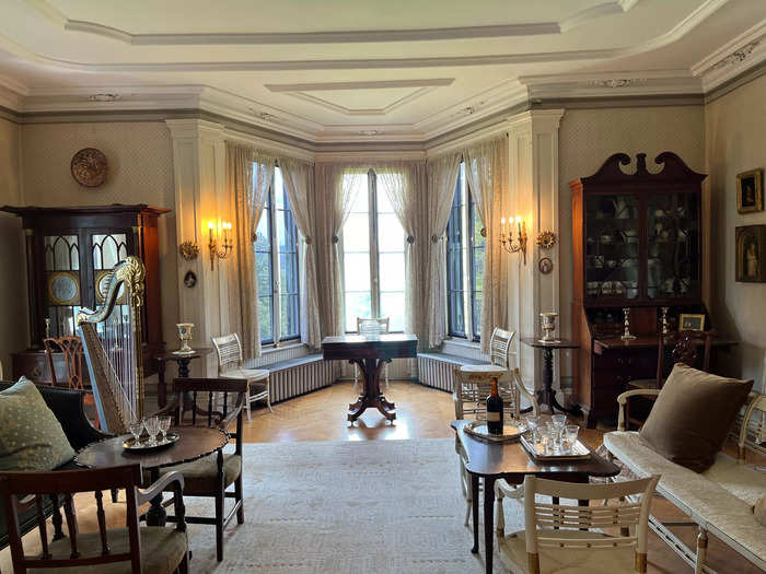 The drawing room was used to entertain guests before and after dinner. The Youngs also hosted dances and concerts here since the furniture was lightweight and easy to rearrange.