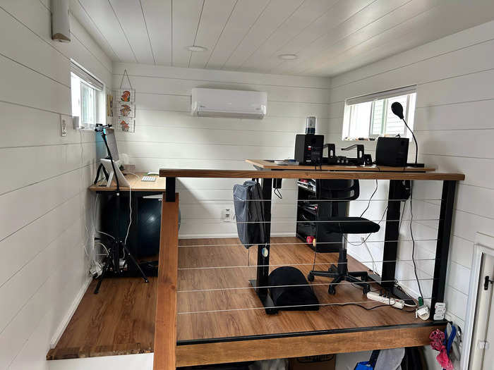We have two adjustable desks and we both work in the loft on a daily basis. This is also where our mini-split AC/heater is located.