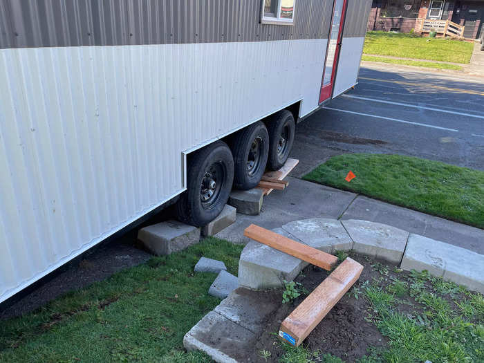 The moving process was expensive — it cost nearly $4,000 — and we had trouble on the way. First, our parking spot was up a steep hill so we struggled to get the house in place.