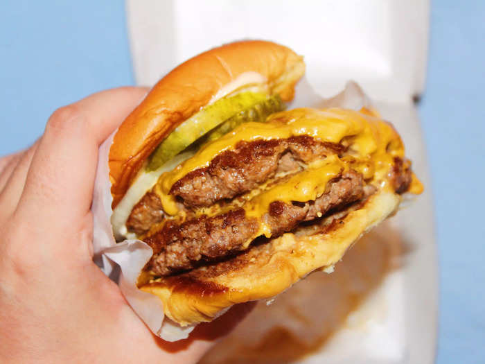 The burger patties were perfectly crispy on the outside and covered in gooey melted cheese.