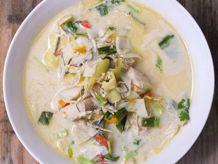 Thai coconut chicken soup, otherwise known as tom kha gai, is a chef-approved dish you can make in a slow cooker.