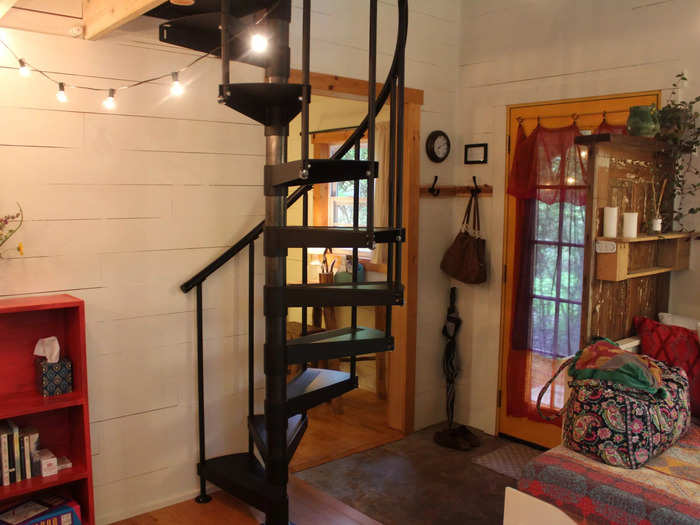 String lights were hung throughout the space, giving the house a warm, inviting glow.