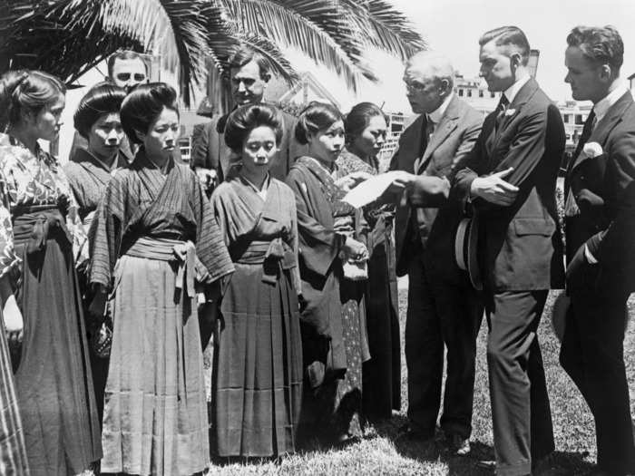 Other minority groups also faced discrimination. Below are Japanese "picture brides" who immigrated to the US in 1920 to marry American men as a result of exclusionary immigration laws.