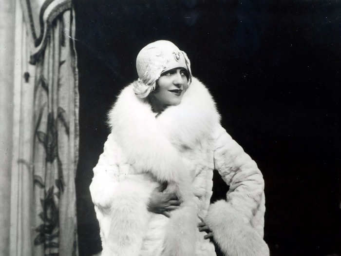 Luxe fabrics, flapper girl silhouettes, and art-deco style dominated the fashion world in the 