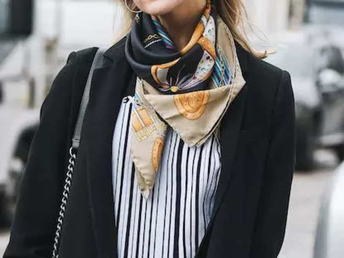 Lightweight scarves are a nice way to elevate outfits in the summer. 