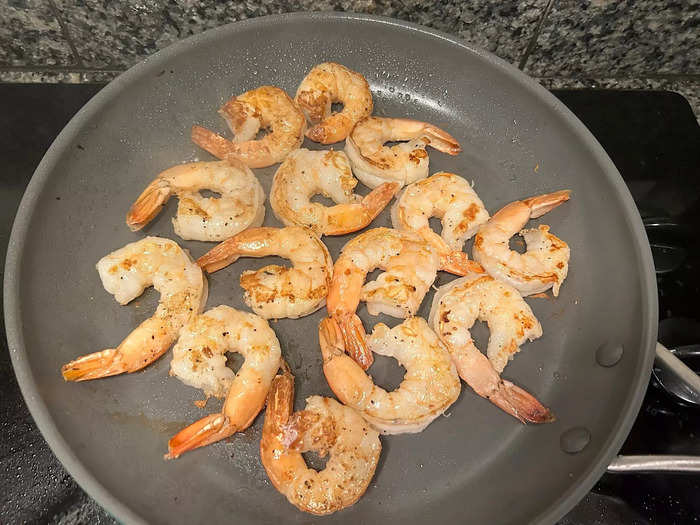 Once my shrimp had turned golden brown, I removed my second pan from the heat and flipped each shrimp.