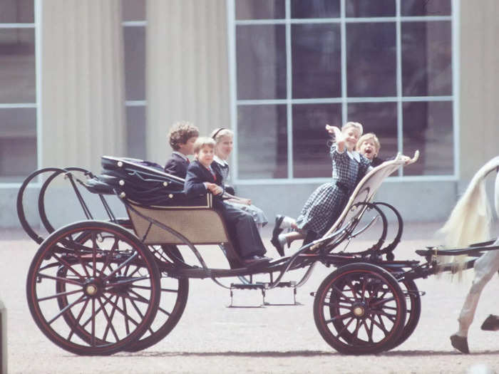 Prince William and Prince Harry were playful with their cousins on a carriage at the 1990 Trooping the Colour.