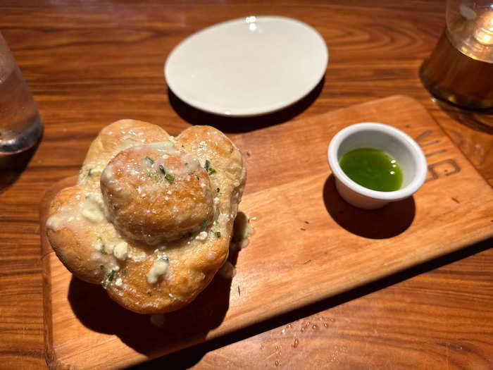 We liked the pull-apart bread, which was topped with blue cheese and served with chive olive oil.