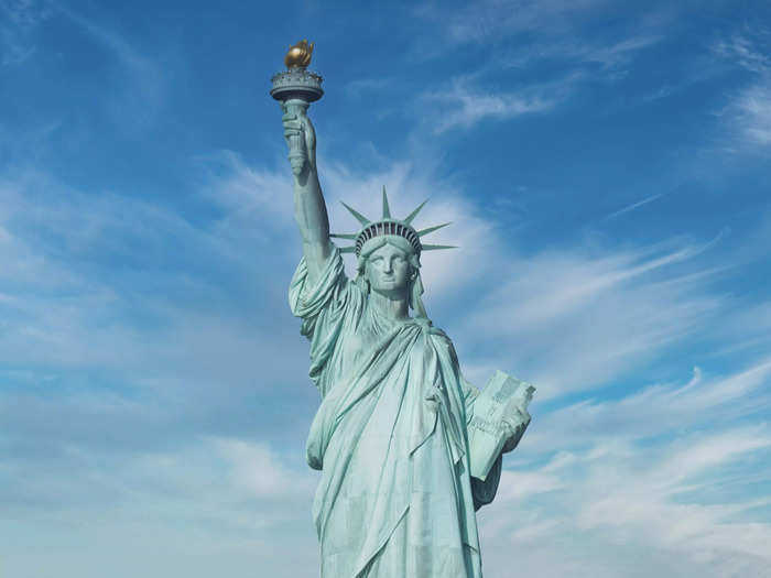 The statue, which is on Liberty Island in New York Harbor, stands as a symbol of freedom.