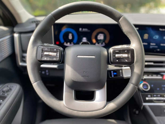 In front of the driver is a new leather-wrapped steering wheel unique to the Santa Fe.