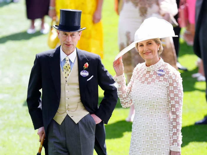 On day two, Prince Edward jazzed up his morning suit with a bright tie while his wife, Sophie, Duchess of Edinburgh, looked chic in a semi-sheer ivory dress covered in daisies.