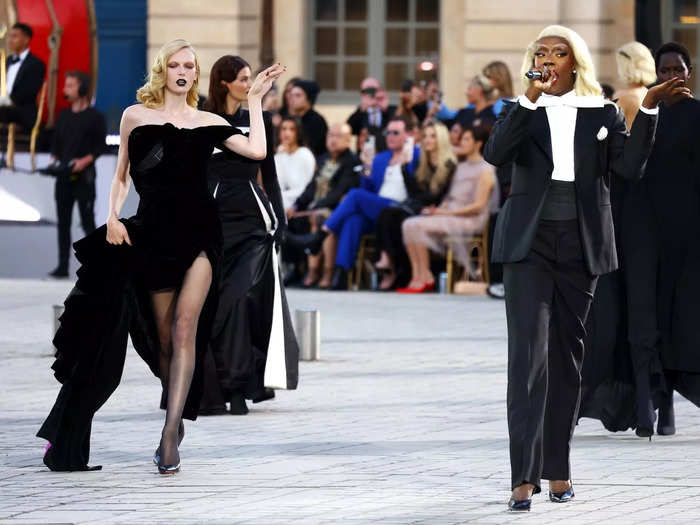 French drag queen Keiona Revlon performed during the show in a Balenciaga suit. 