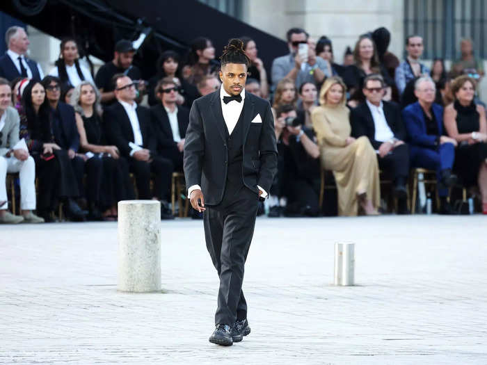 Jeremy Pope danced down the runway with a group of performers behind him. He wore a Thom Browne tuxedo.