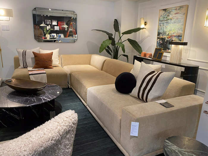 The Faible wheat-performance-velvet sectional sofa is sleek. 