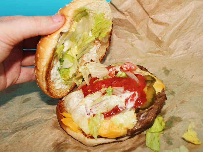 A Whopper comes with a quarter-pound beef patty, pickles, onions, lettuce, tomato, ketchup, and mayonnaise. I always add cheese for an additional $0.50. 