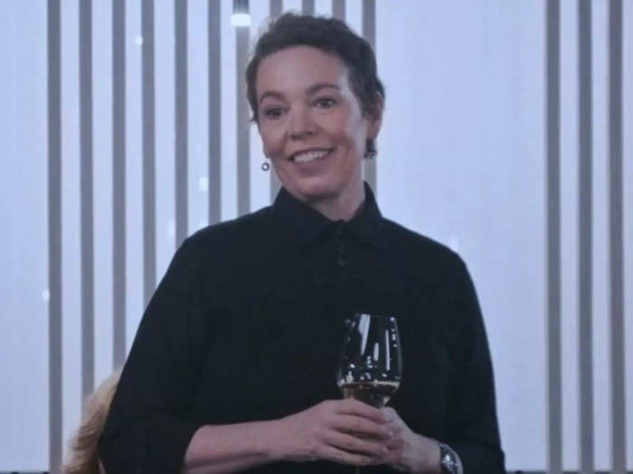 Olivia Colman reprises her role as Andrea Terry, the owner of the upscale restaurant Ever.  
