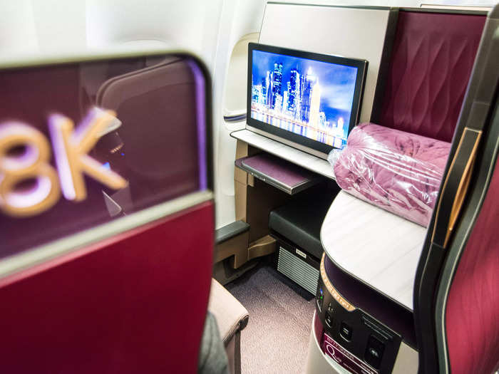 The seat comes with the regularly expected business-class perks, including a giant television, power, gourmet meals, and storage. 