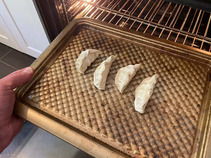 Making potstickers in the oven allows me to cook large batches at once.