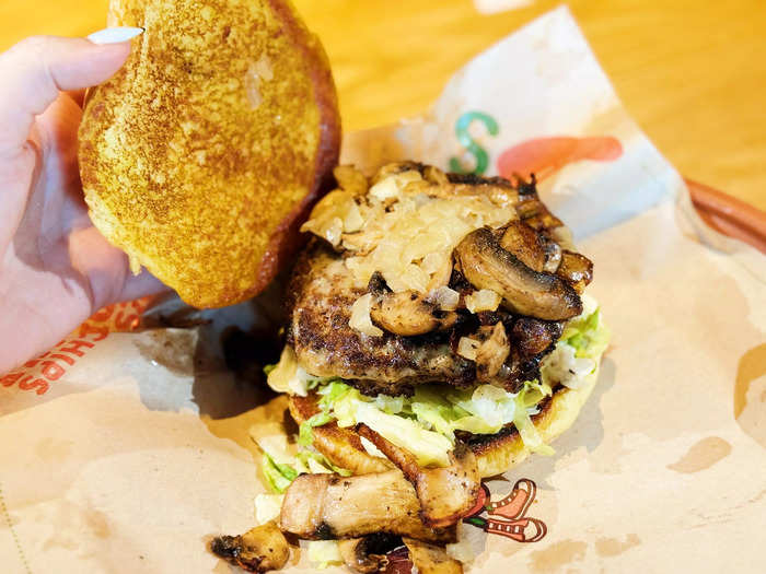 The Mushroom Swiss burger comes with sauteed onions, mushrooms, Swiss cheese, lettuce, tomato, and mayonnaise. 