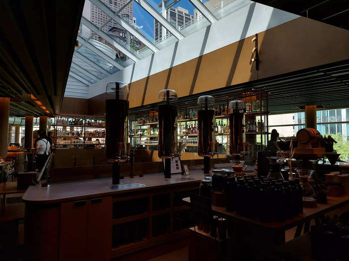 As well as large windows looking down onto Michigan Avenue, the building has skylights which make the spirit bottles at the top-floor bar twinkle.