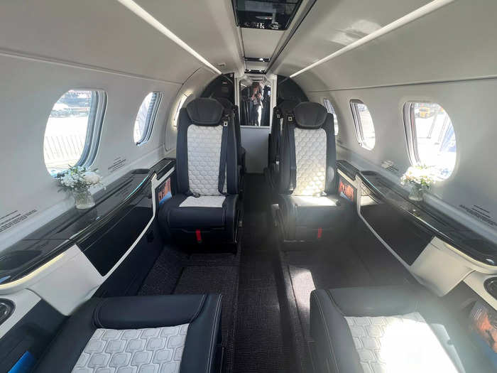 The cabin is configured with six seats.