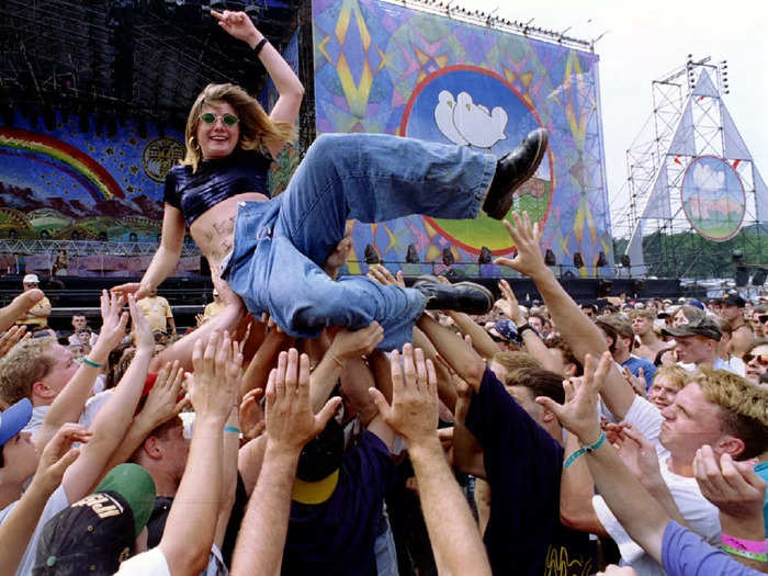This picture could have been taken in 2024 — both crowdsurfing and overalls are popular today.