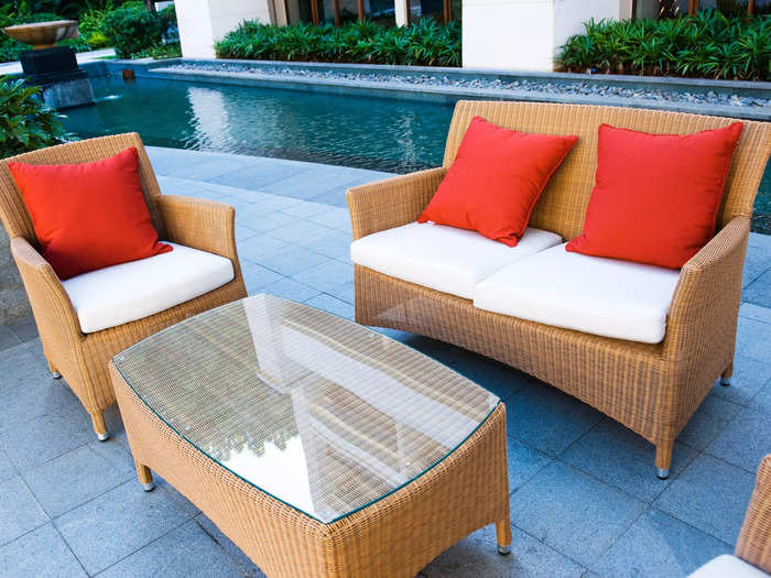 Opt for light colors and woods for outdoor furniture.