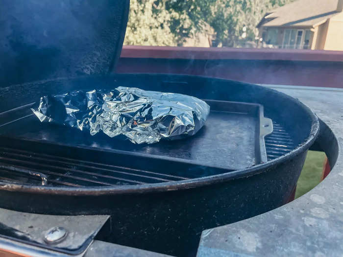 I wrapped the sauced ribs in foil before throwing them on.