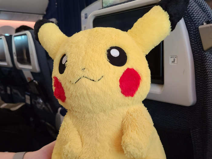 The crew had a large stuffed Pikachu that they brought around to children on the flight.