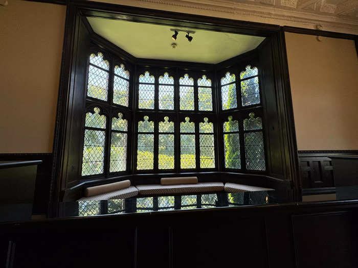 The billiards room also has a luxurious window seat.