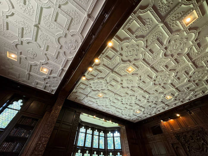 The ornate ceiling in this room is original, with busts of Shakespeare and other scholars engraved into the plaster.