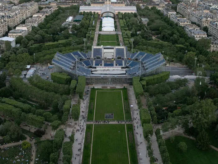 Beach-volleyball players will compete at the Eiffel Tower Stadium built at the base of the famous landmark.