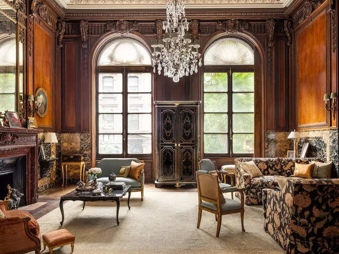 True to its Gilded Age roots, the home features historic fireplaces and chandeliers fit for royalty. 