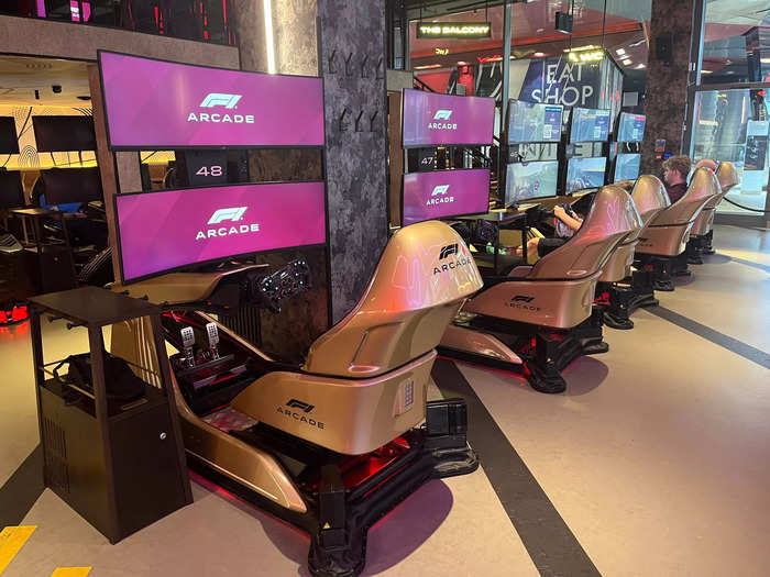 I was surprised at how similar the machines felt to driving a car with accelerator and brake pedals. Staff told me that the simulators can adapt to in-game weather conditions, such as the feel of a slick track on a rainy day. 