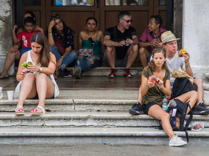 Italy banned sitting and eating in some public spaces.