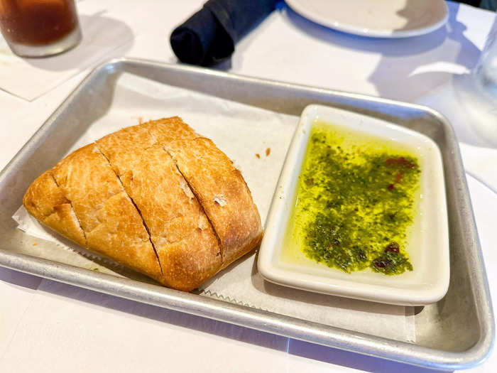 The complimentary bread was served with a tasty olive-oil dip.