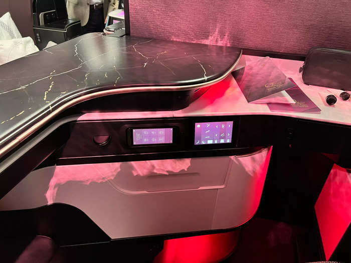 The suites have two touchscreen control panels that control the seat position and ambient mood lighting.