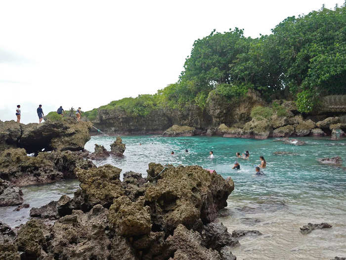 The warm weather is perfect for swimming. Guam is surrounded by coral reefs.