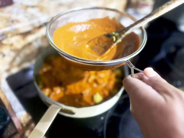 After straining the curry, it was time to combine the sauce and the chicken.