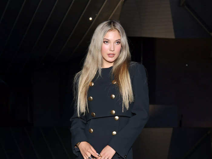 Eileen Gu, an Olympic freestyle skier, looked demure in this black suit dress.