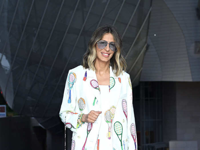 Designer Mira Mikati got into the Olympic spirit with this white suit covered in multicolored tennis rackets.