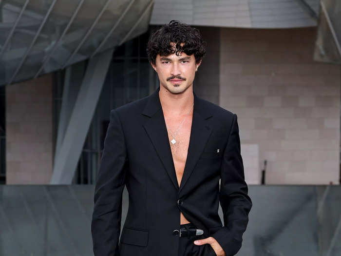 Actor Gavin Leatherwood skipped the shirt and most of his buttons to attend the event.