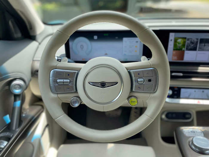 In front of the driver are a heated steering wheel and digital gauge cluster. 